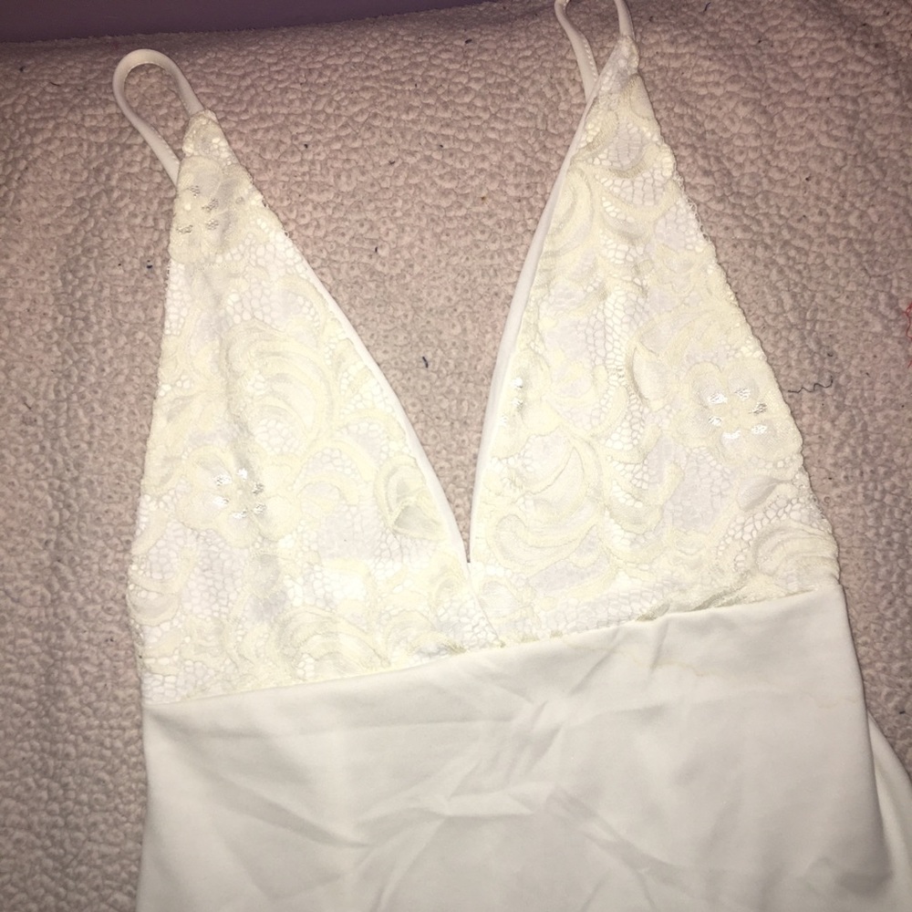 White plunge neckline low back dress